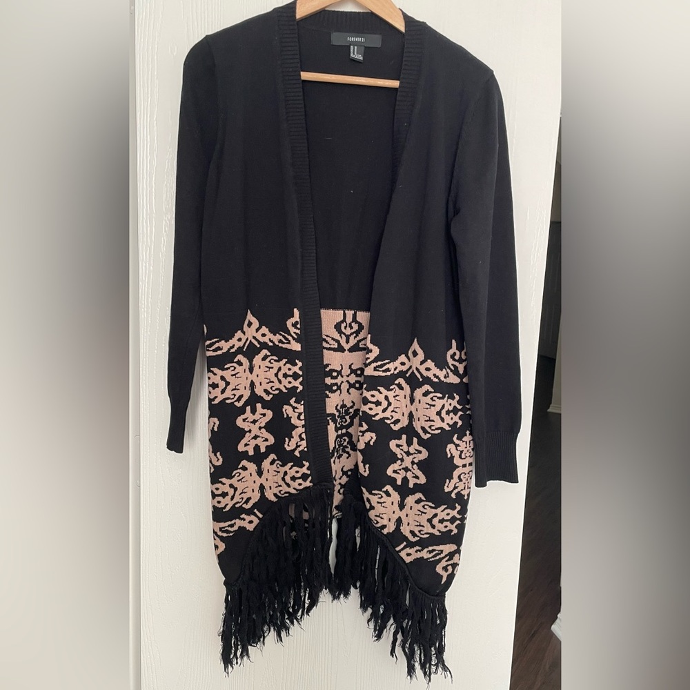 Women’s black cardigan size medium. Black jacket with tassels, long black coat